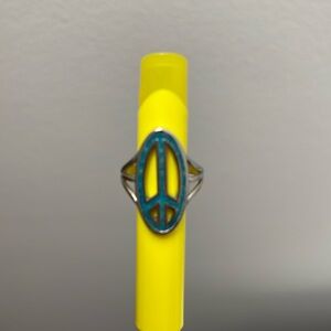 Peace ring with turquoise color material